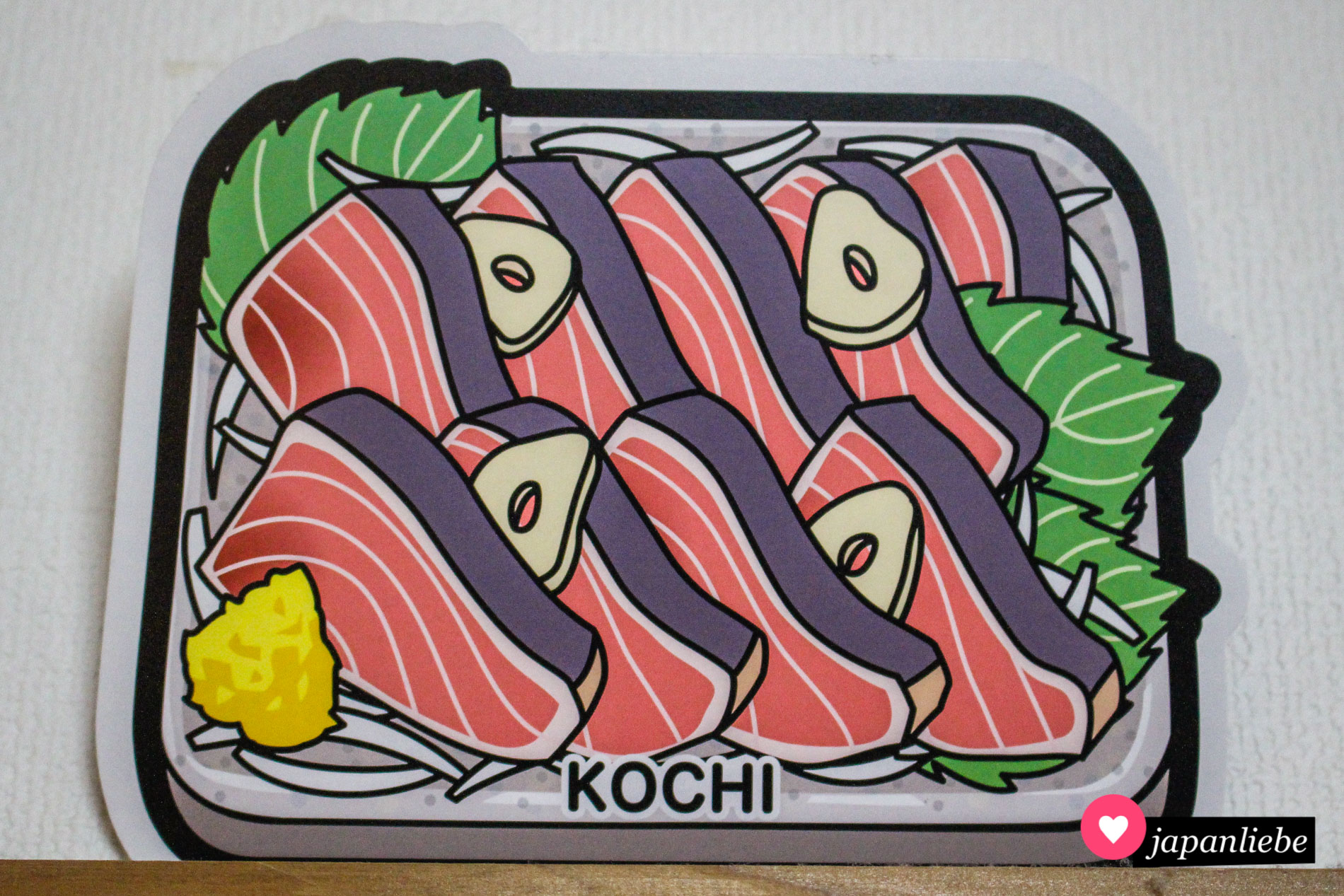 Dieses gotochi-Postkarte zeigt eine lokale Spezialität der Präfektur Kōchi: Shimizu-Makrelen-Sashimi.
